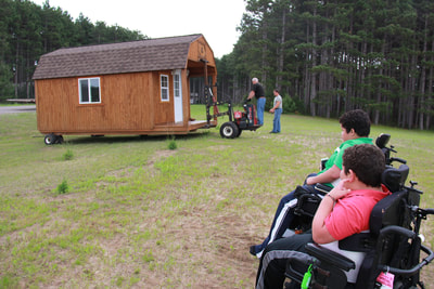 Grandview Buildings and Make-a-Wish Minnesota partnered together to help Marcelo's wish come true!  Putting together Marcelo's 12x20 Lofted Barn Cabin Clubhouse was an amazing experience for everyone involved!