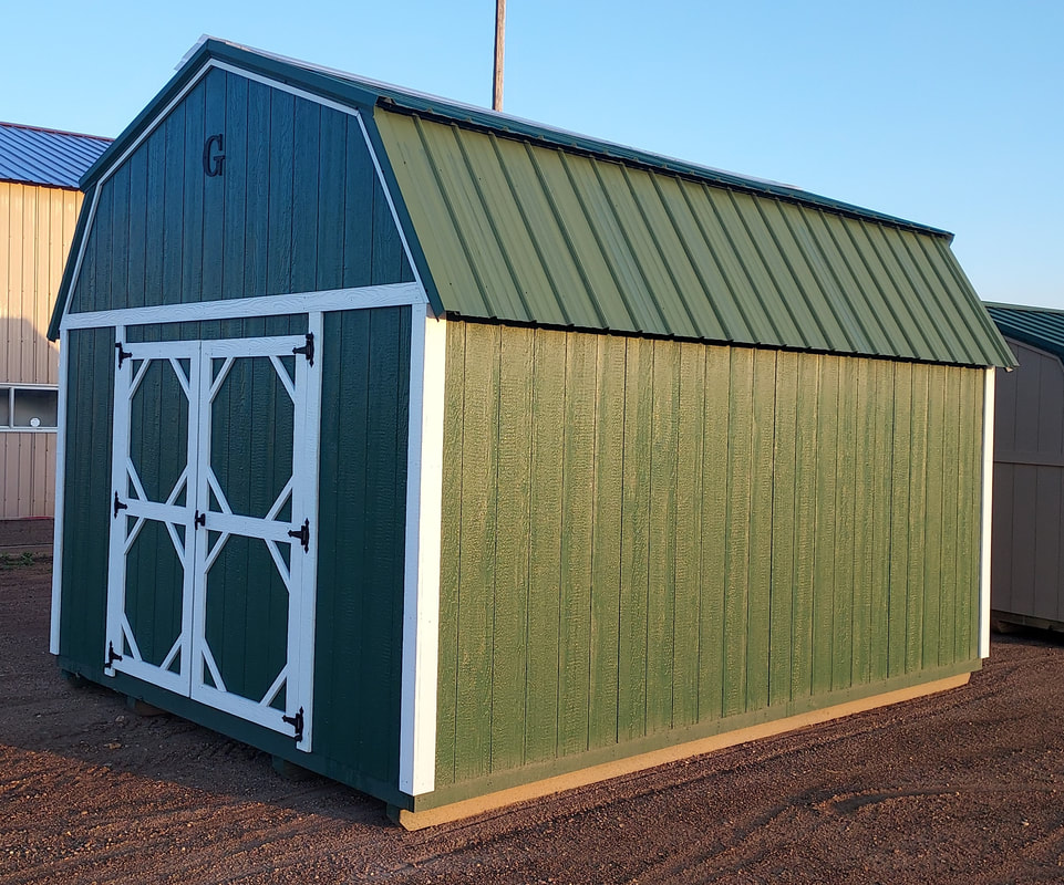 8x12 Lofted Barn with Green Metal Roof and Douglas Fir Siding stained Honeygold